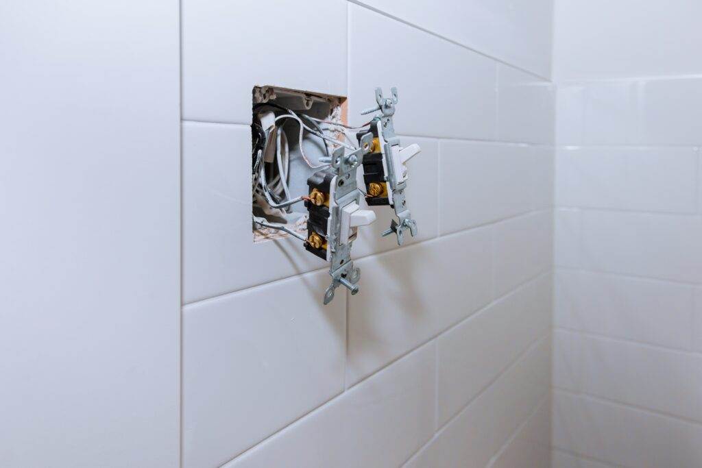 a white wall with wires and wires